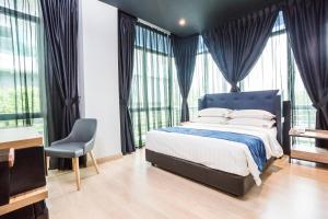 Postel nebo postele na pokoji v ubytování Manhattan Business Hotel TTDI