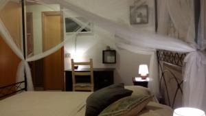 A bed or beds in a room at Casammare