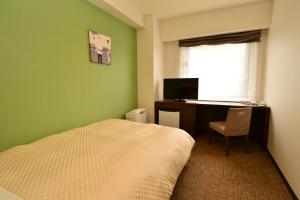 TV a/nebo společenská místnost v ubytování Hotel Sunroute Sano