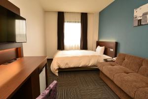 TV a/nebo společenská místnost v ubytování Hotel Sunroute Sano + 16 fotografií