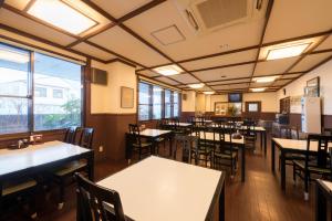 Reštaurácia alebo iné gastronomické zariadenie v ubytovaní Towada City Hotel