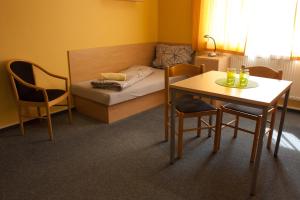 Posteľ alebo postele v izbe v ubytovaní Apartmány REKO Kadaň
