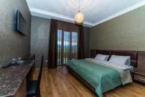 Letto o letti in una camera di Hotel New Telavi