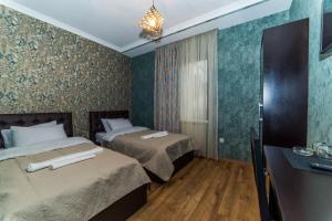 Letto o letti in una camera di Hotel New Telavi