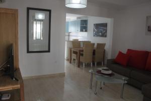 a living room with a couch and a table at Appartement 179 in Gran Alacant