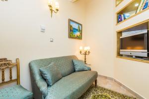Televízia a/alebo spoločenská miestnosť v ubytovaní Villas Arbia - Margita Beach hotel