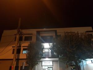 a building with a balcony on the side of it at Hamilton on Beaumont in Newcastle