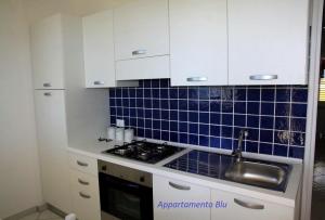 A cozinha ou cozinha compacta de Villa Oblò
