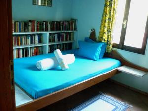 A bed or beds in a room at The Place by the Sun