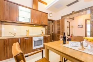 Kuchyň nebo kuchyňský kout v ubytování Villas Arbia - Margita Deluxe Beach Hotel