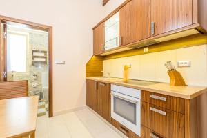 Kuchyň nebo kuchyňský kout v ubytování Villas Arbia - Margita Deluxe Beach Hotel