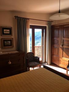 A bed or beds in a room at Villa Ludoniccò Még 37 kép