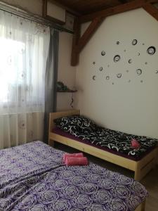 Postel nebo postele na pokoji v ubytování Apartmany Kras
