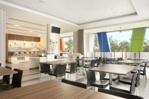 מסעדה או מקום אחר לאכול בו ב-Amaris Hotel Margorejo Surabaya