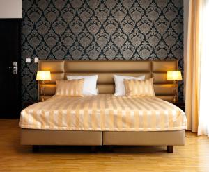 Кровать или кровати в номере Hotel Oriza