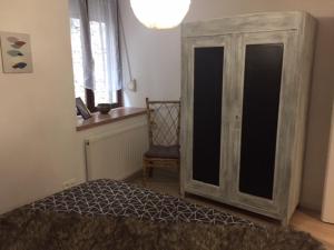Postel nebo postele na pokoji v ubytování Gîte sur Loue