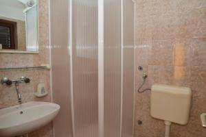 Koupelna v ubytování Apartments Lonić