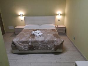 Postel nebo postele na pokoji v ubytování Casa Aurora B&B