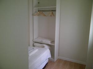 Cama o camas de una habitación en Apartamentos Mirabal