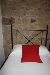 Ein Bett oder Betten in einem Zimmer der Unterkunft A Casa da Meixida