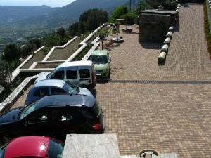 a group of cars parked in a parking lot at Anastasia Luxury Villas in Gavrio