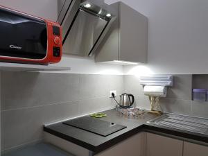 Kuchnia lub aneks kuchenny w obiekcie NoMapartments Il Viaggiatore