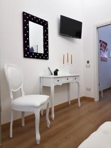 Telewizja i/lub zestaw kina domowego w obiekcie NoMapartments Il Viaggiatore