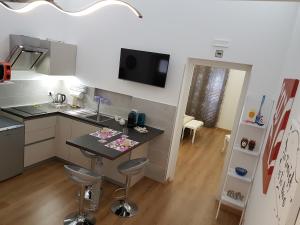 Kuchnia lub aneks kuchenny w obiekcie NoMapartments Il Viaggiatore