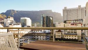 a view of a city with mountains in the background at At Greenmarket Place in Cape Town