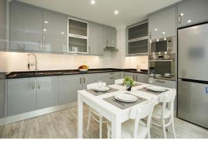 Kuchyň nebo kuchyňský kout v ubytování Sintra Design Apartment
