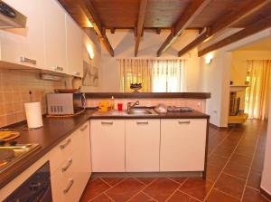 Kuchyň nebo kuchyňský kout v ubytování House Franko 1330