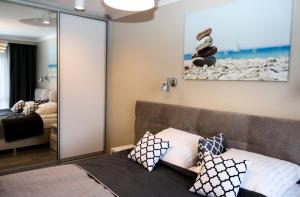 Posteľ alebo postele v izbe v ubytovaní Apartament Luxury