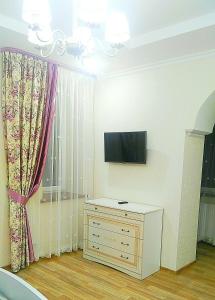 TV o dispositivi per l'intrattenimento presso Apartment on Stepana Bandery 35