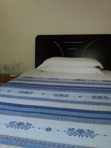 Albergo Luca 객실 침대