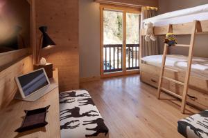 Postel nebo postele na pokoji v ubytování Chandolin Boutique Hotel