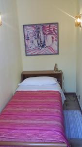 Albergo Luca 객실 침대