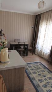 Posezení v ubytování Guest House on V. Pshavela 50
