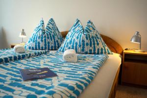 Cama o camas de una habitación en Arizona apartman