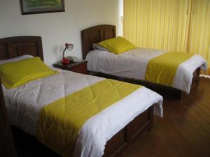 Letto o letti in una camera di Hotel Rincón Escandinavo