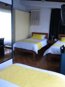 Letto o letti in una camera di Hotel Rincón Escandinavo