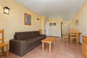 Posedenie v ubytovaní Apartamentos Embajador