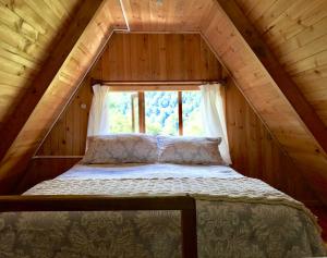 מיטה או מיטות בחדר ב-Ralun Patagonia