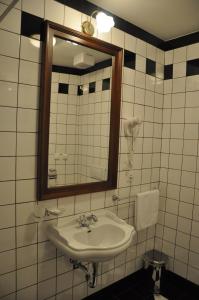 Koupelna v ubytování Pivovar Hotel Na Rychtě + 37 fotografií
