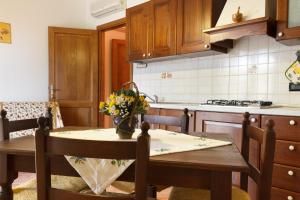 Kuchyň nebo kuchyňský kout v ubytování Agriturismo Il Rustico