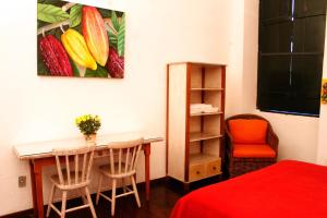 A television and/or entertainment center at Studio do Carmo Boutique Hotel