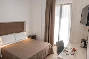 Posteľ alebo postele v izbe v ubytovaní I Cordari B&B