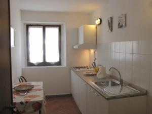 Kuchyň nebo kuchyňský kout v ubytování Residence Casprini da Omero