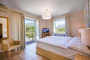 Postel nebo postele na pokoji v ubytování Villa Delta Suites House