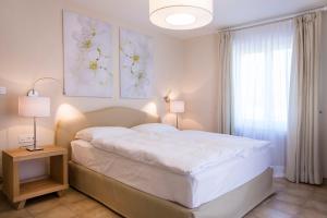 Postel nebo postele na pokoji v ubytování Villa Delta Suites House