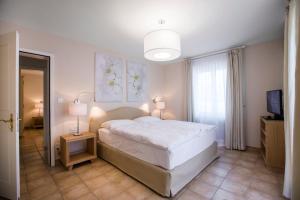 Postel nebo postele na pokoji v ubytování Villa Delta Suites House